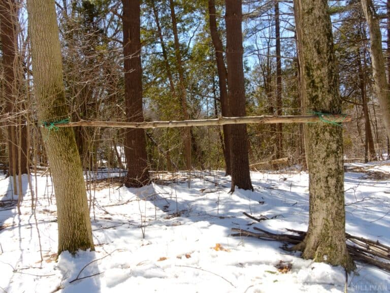 shelter crossbar supported with paracord