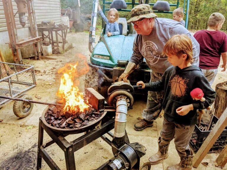 blacksmith working with open fire