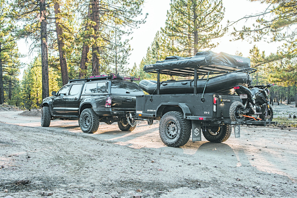 The bug out toyota tacoma is pulling the XVenture XV-2 Off-Road Trailer is a fully capable trailer especially the way Jennings has outfitted his. Equipped with the same Method 105 Series Beadlock wheels and 35-inch Toyo Open Country R/T Tires as the Tacoma, the XV-2's overland capabilities are further enhanced.