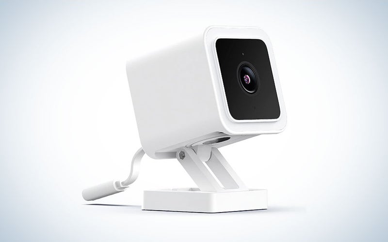 A WYZE camera on a plain background