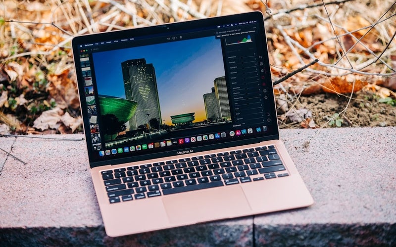 Stan's MacBook Air M1 outside with the Albany skyline on the screen