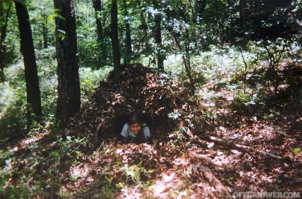 Carleigh in a debris shelter.