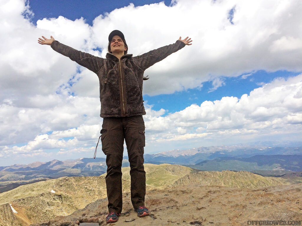 Photo of carleigh fairchild on top of a hill.