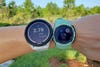 Garmin Forerunner 955 Solar and Instinct 2S Solar side by side on a wrist