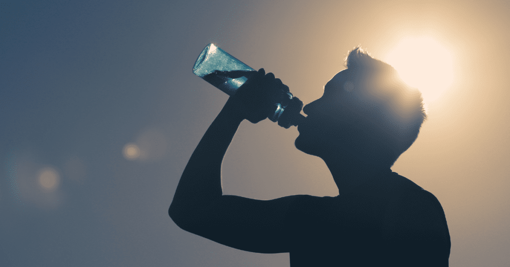 a man drinking water