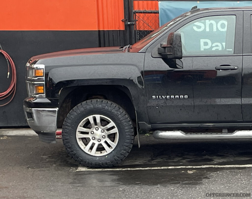 The front end of a pickup truck.