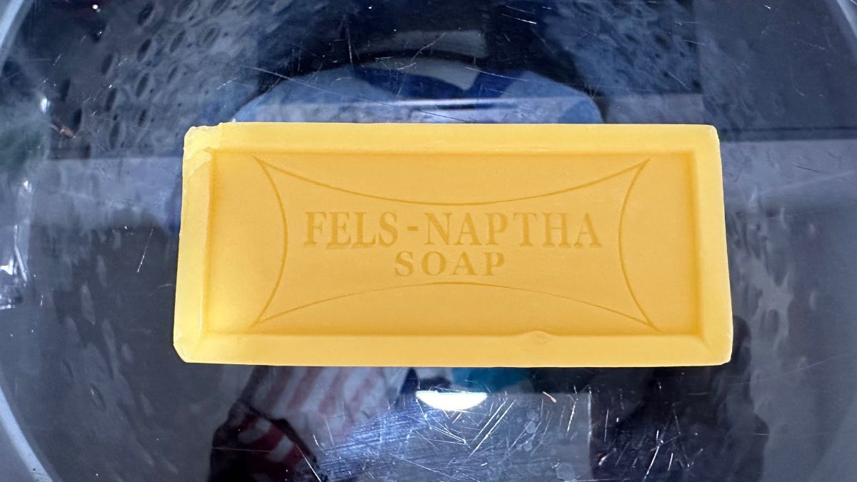 Fels-Naptha soap bar on laundry machine.